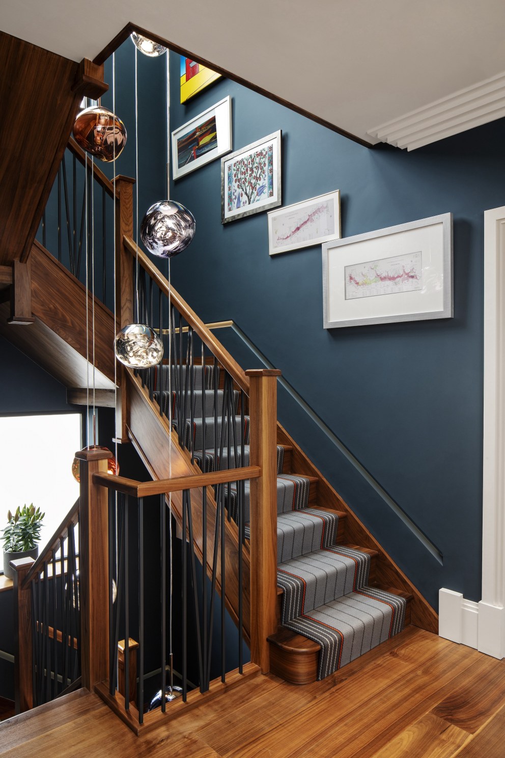 Sea front family home  | Staircase with bespoke chandelier | Interior Designers